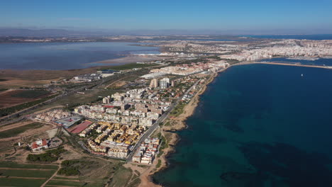 Spain-Torrevieja-aerial-shot-lake-and-mediterranean-sea-seaside-town